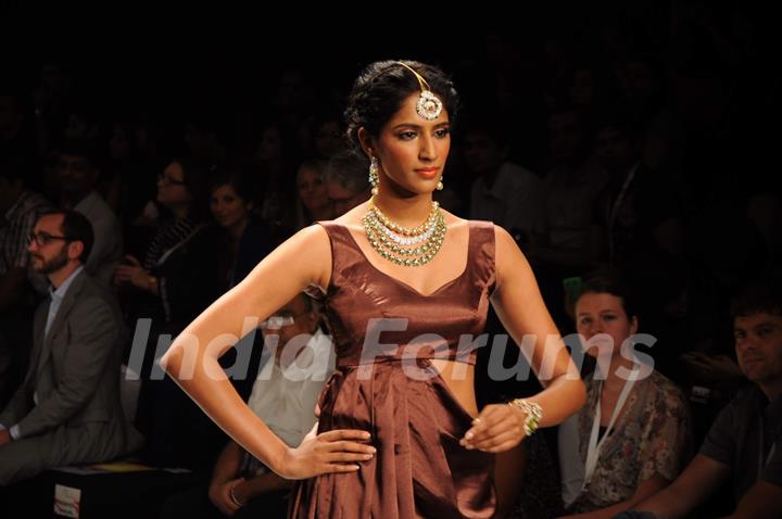 Models walk on the ramp for Dipti Amisha at IIJW 2011 show day 3. .