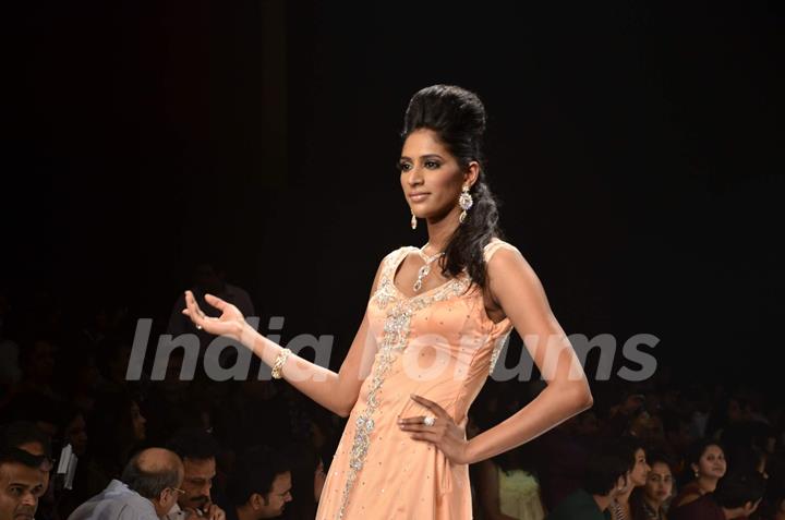 Models walk on the ramp for Agni at IIJW 2011 show day 3. .