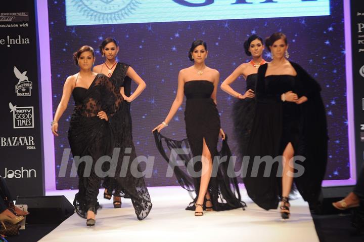 Models walks the ramp for Gia India at IIJW 2011 Day 4. .