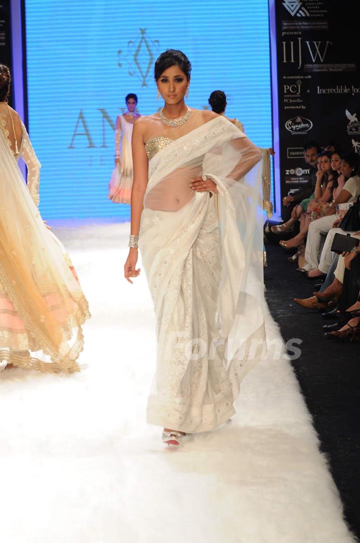 Models walks the ramp for Anmol at IIJW 2011 Day 4. .