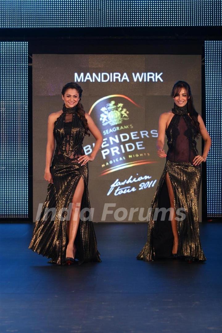 Malaika Arora Khan and Amrita Arora walk the ramp for Mandira Wirk at the Blenders Pride Fashion Tour 2011