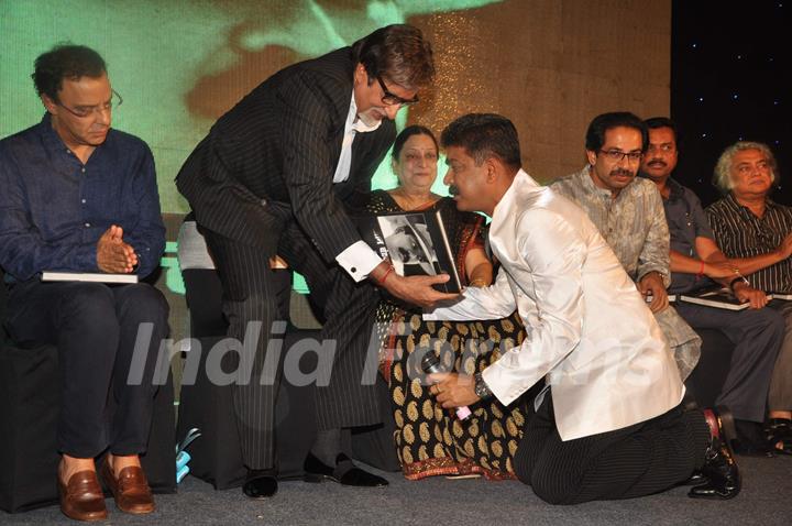 Megastar Amitabh Bachchan unveils Nitin Desai's book at his 25th year celebrations at JW Marriott in Mumbai. .