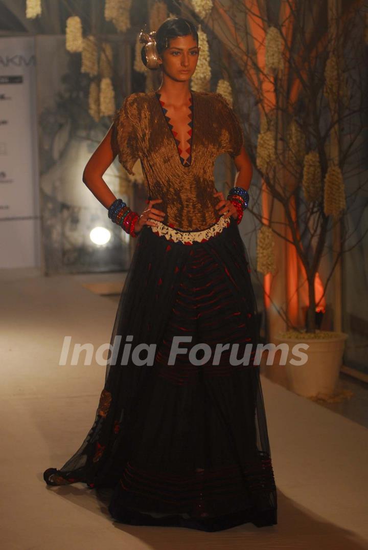 Arjun Rampal walks the ramp for Rohit Bal at Lakme Fashion Week 2011 launch