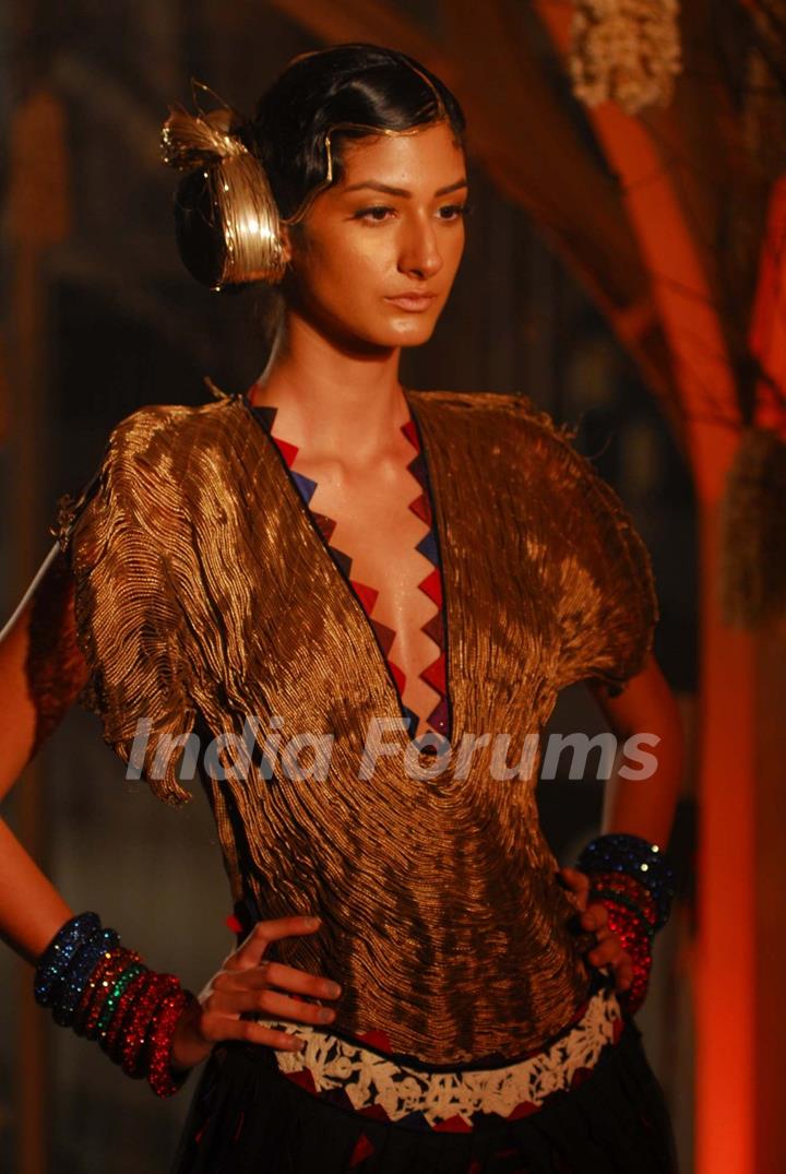 Arjun Rampal walks the ramp for Rohit Bal at Lakme Fashion Week 2011 launch