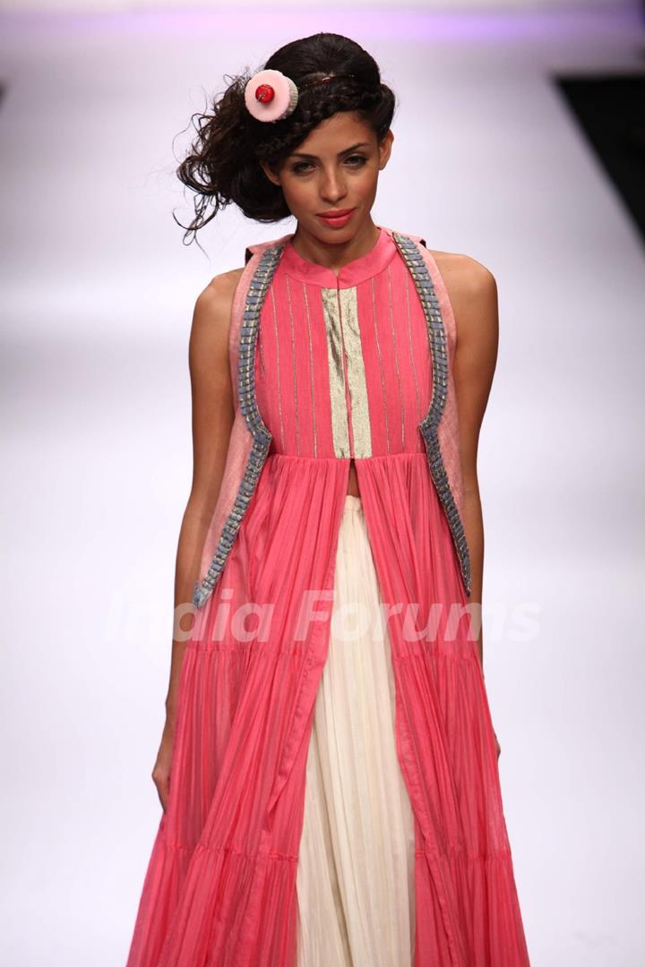 Model displays designer VJ Balhara's creation during the Lakme Fashion Week Day 3 in Mumbai. .