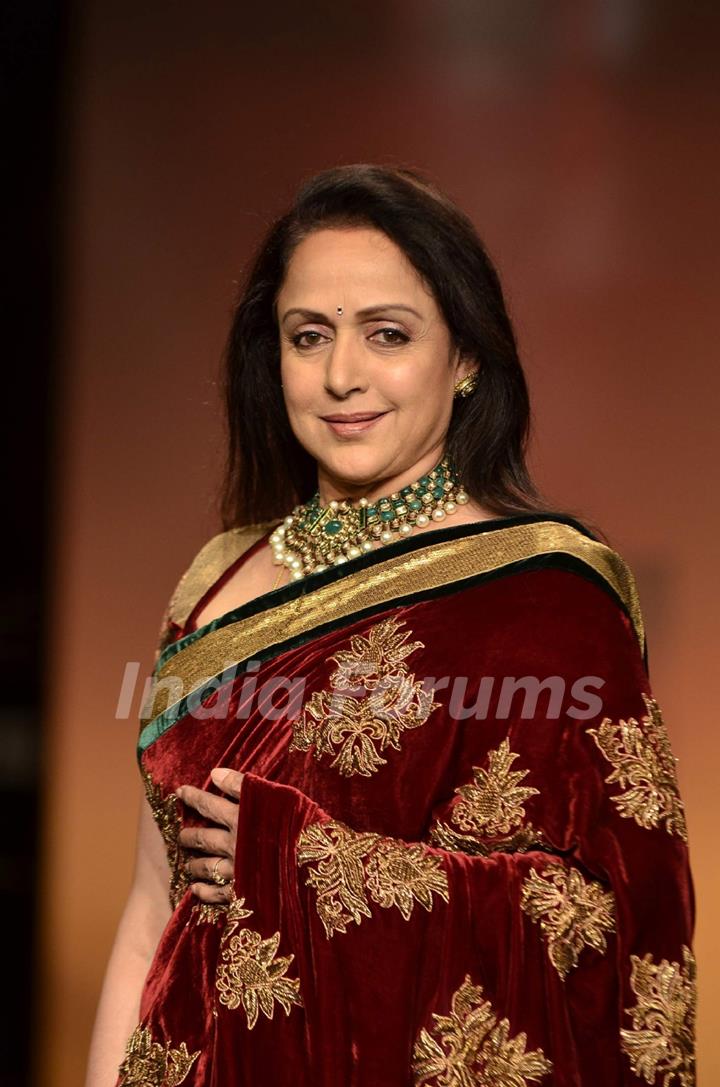 Hema Malini display creations by designers Bhumika and Shyamal during Lakme Fashion Week Day 3 in Mumbai. .