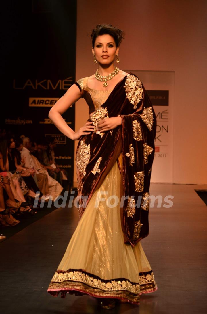 Model display creations by designers Bhumika and Shyamal during Lakme Fashion Week Day 3 in Mumbai. .