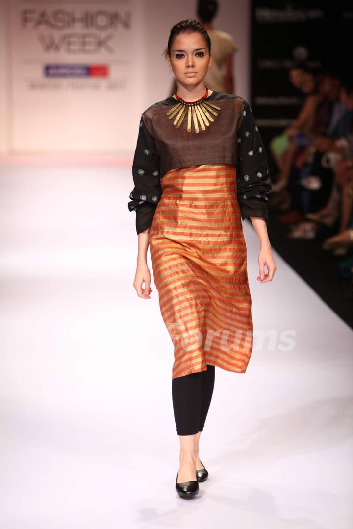 Model displays designer Paromita Banerjee's creation during the Lakme Fashion Week Day 3 in Mumbai. .