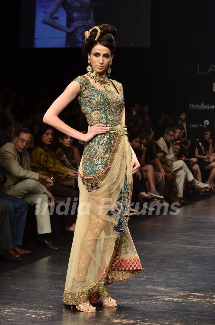 Model displays designer Neeta Lulla's creation during the Lakme Fashion Week Day 4 in Mumbai. .