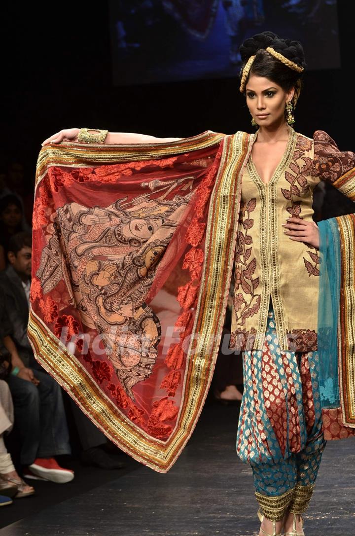 Model displays designer Neeta Lulla's creation during the Lakme Fashion Week Day 4 in Mumbai. .