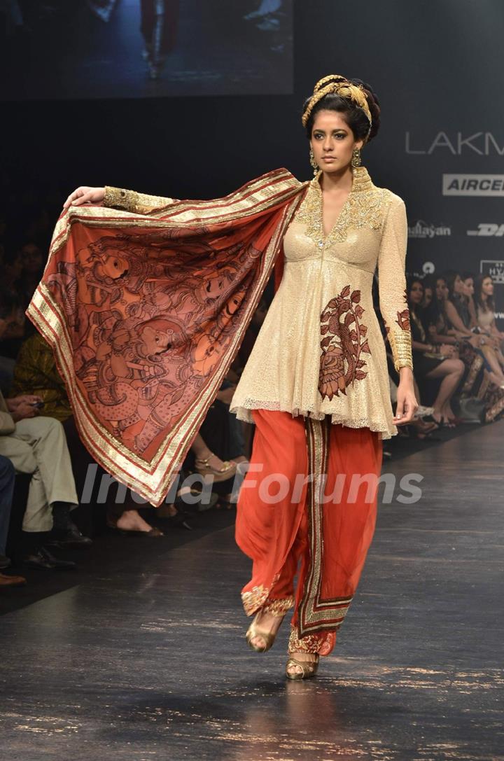 Model displays designer Neeta Lulla's creation during the Lakme Fashion Week Day 4 in Mumbai. .