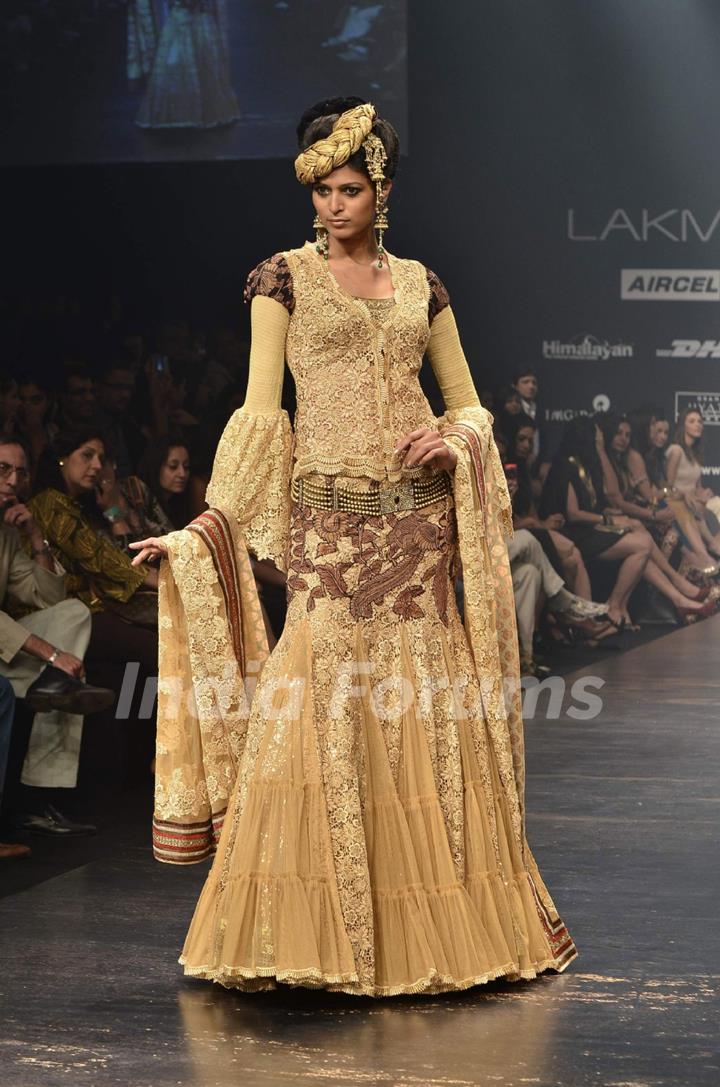 Model displays designer Neeta Lulla's creation during the Lakme Fashion Week Day 4 in Mumbai. .