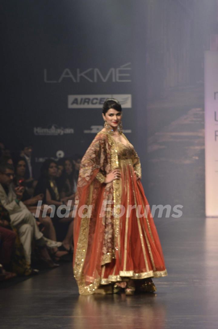 Model displays designer Neeta Lulla's creation during the Lakme Fashion Week Day 4 in Mumbai. .