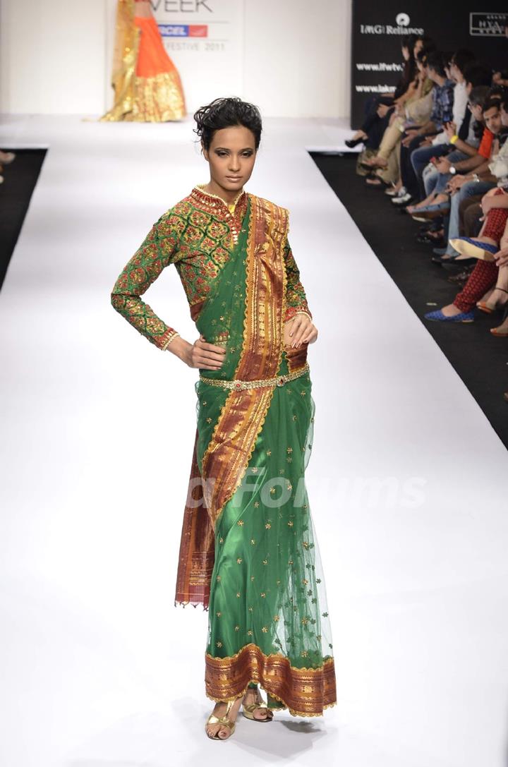 Model displays designer Preeti S. Kapoor's creation during the Lakme Fashion Week Day 5 in Mumbai. .