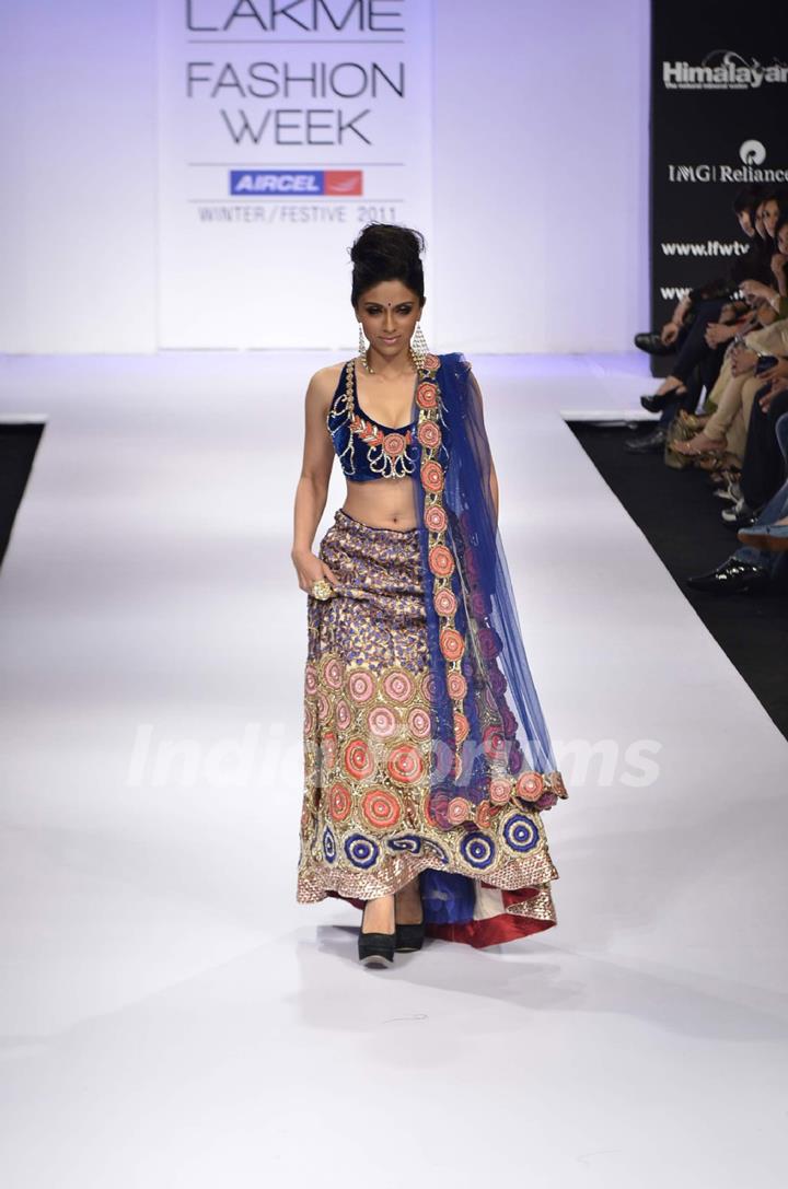 Model displays designer Nandita Thirani's creation during the Lakme Fashion Week Day 5 in Mumbai. .