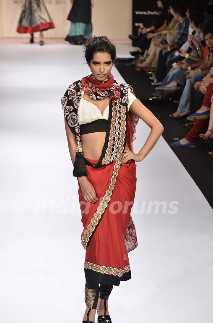 Model displays designer Nandita Thirani's creation during the Lakme Fashion Week Day 5 in Mumbai. .