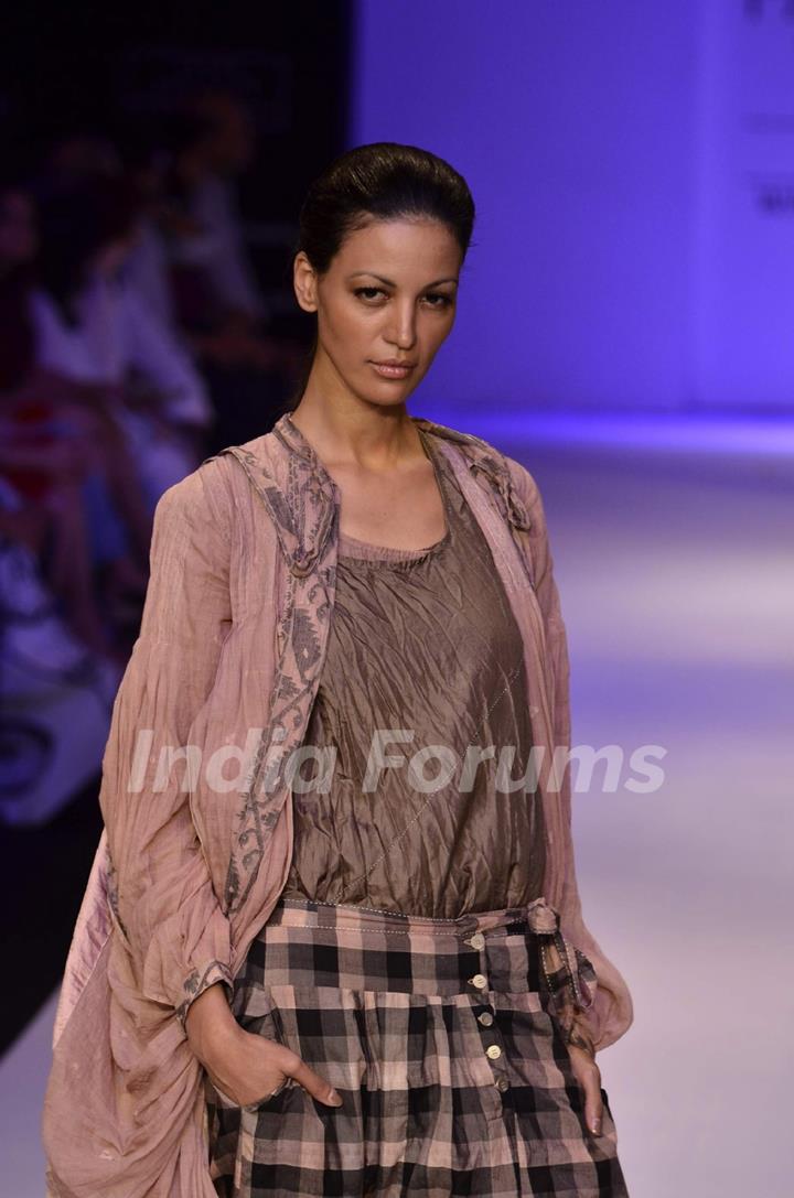 Model displays designer Kallol Datta's creation during the Lakme Fashion Week Day 5 in Mumbai. .