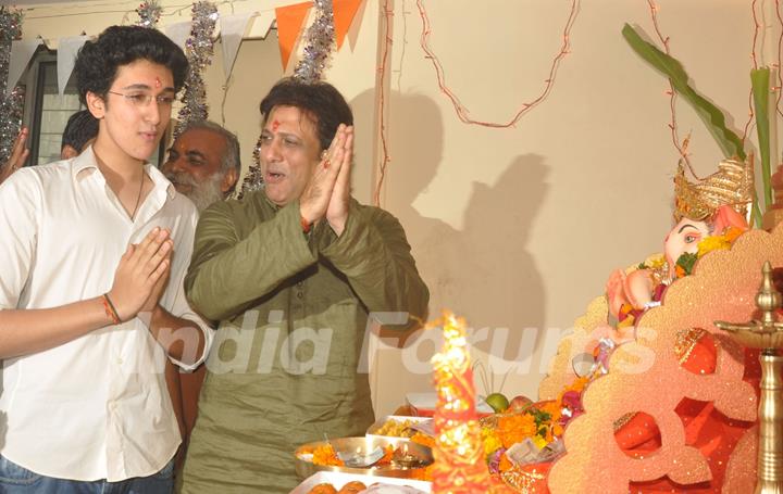 Govinda paying devote to Lord Ganesha during the occasion of Ganesh Chaturthi at their home