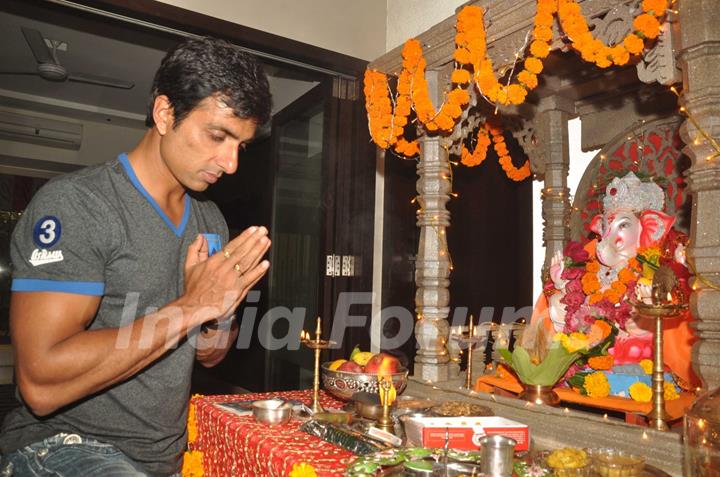 Sonu Sood paying devote to Lord Ganesha during the occasion of Ganesh Chaturthi at their home