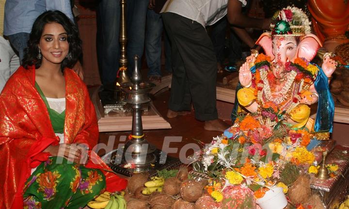 Mahie Gill paying devote to Lord Ganesha during the occasion of Ganesh Chaturthi at their home