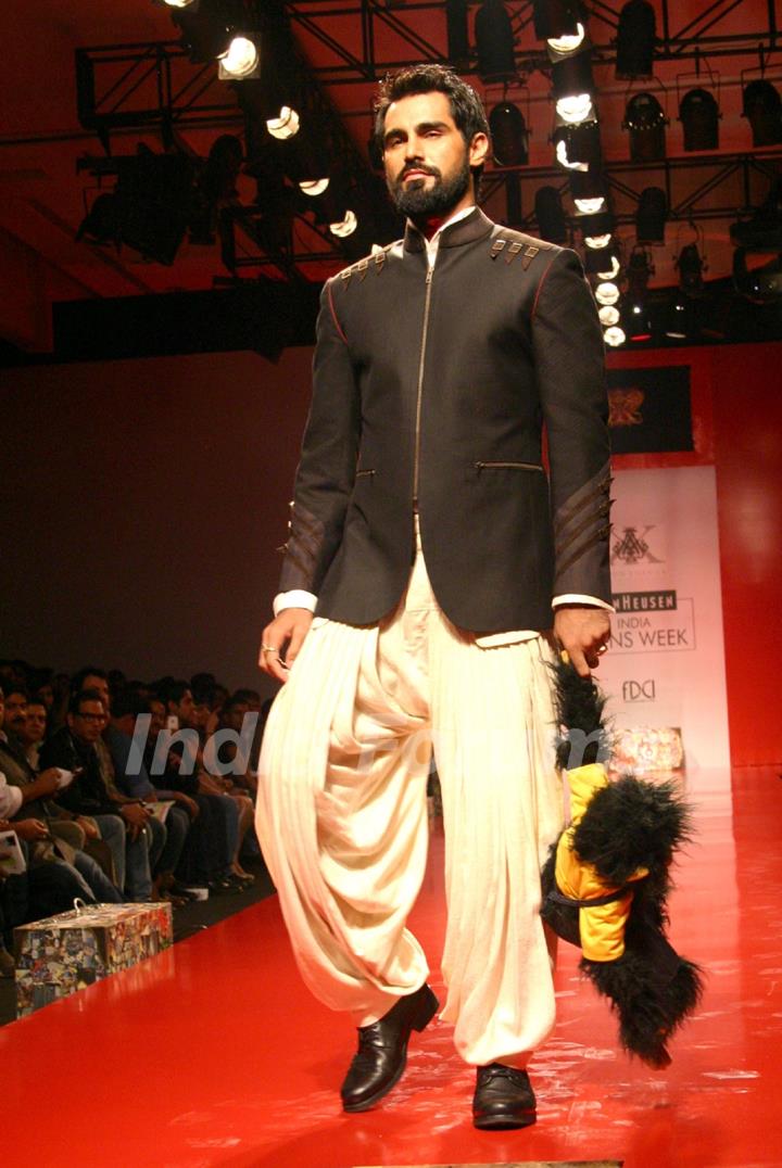 A model showcasing designer Arjun Khanna's creation at the Ven Heusen India Mens Week 2011, in New Delhi on Friday. .