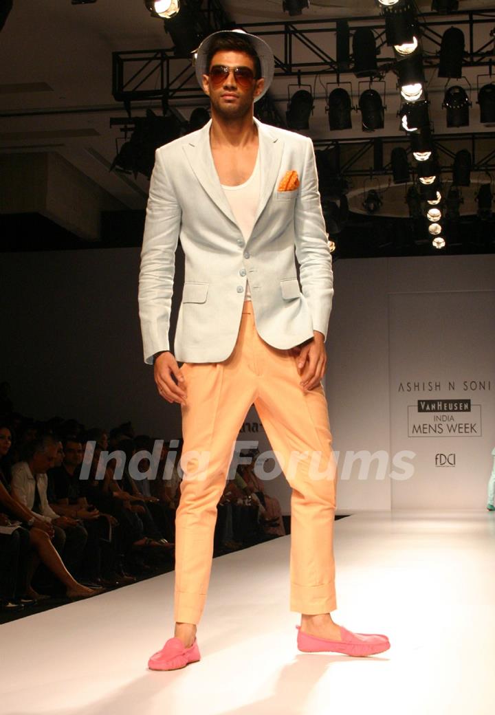 A model showcasing designer Ashish N Soni's creation at the Van Heusen India Mens Week 2011,in New Delhi on Saturday. .
