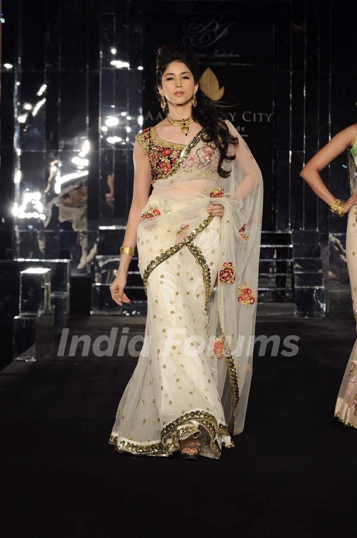 Model walks the ramp for designer Bhairavi Jaikishen's show at Amby Valley India Bridal Week day 2. .