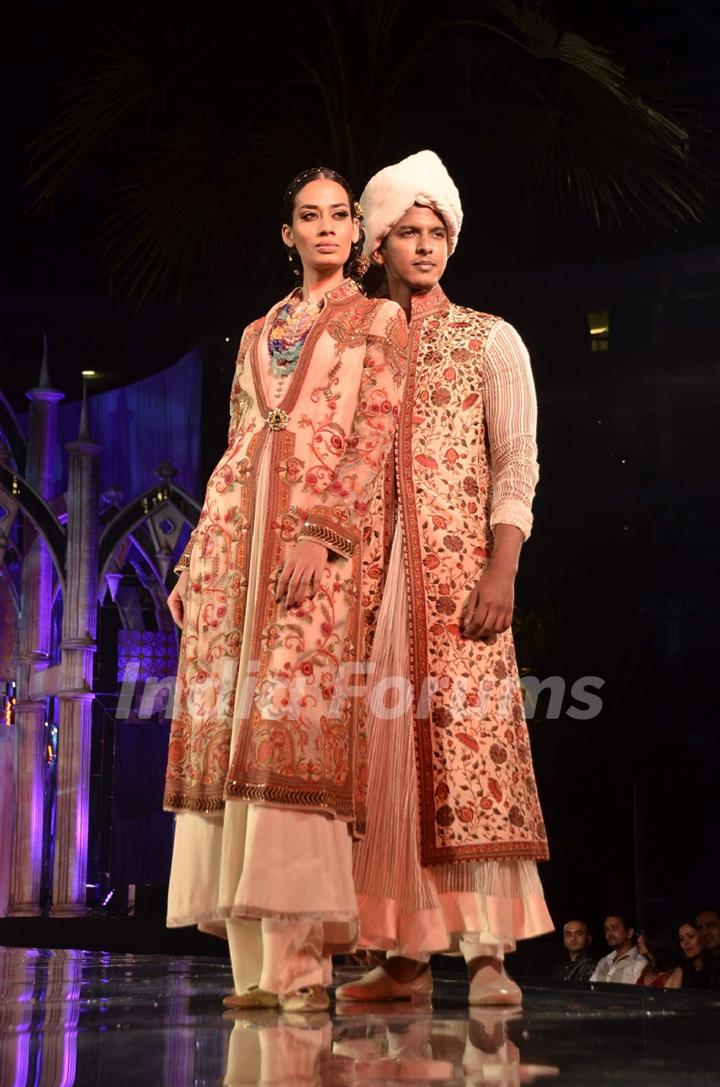 Models walk the ramp for Tarun Tahiliani show at Aamby Valley Fashion week. .