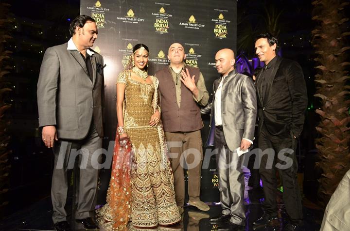 Models walk the ramp for Tarun Tahiliani show at Aamby Valley Fashion week. .