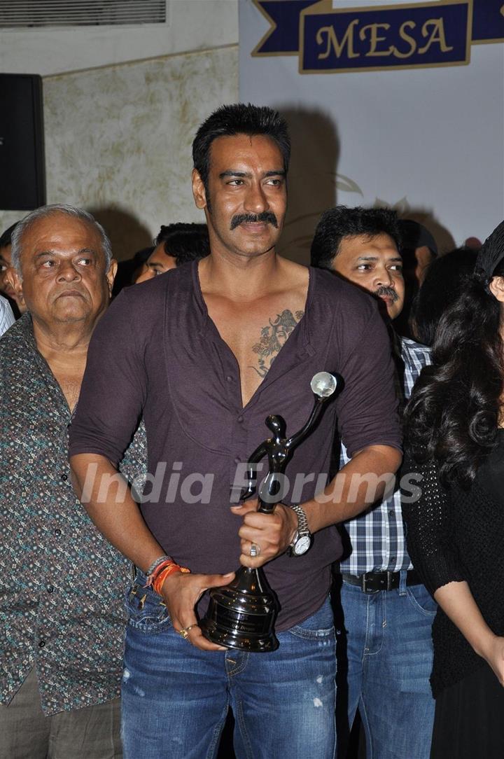 Ajay Devgan felicitated by Ex Mithibai College association headed by Krishna Hegde