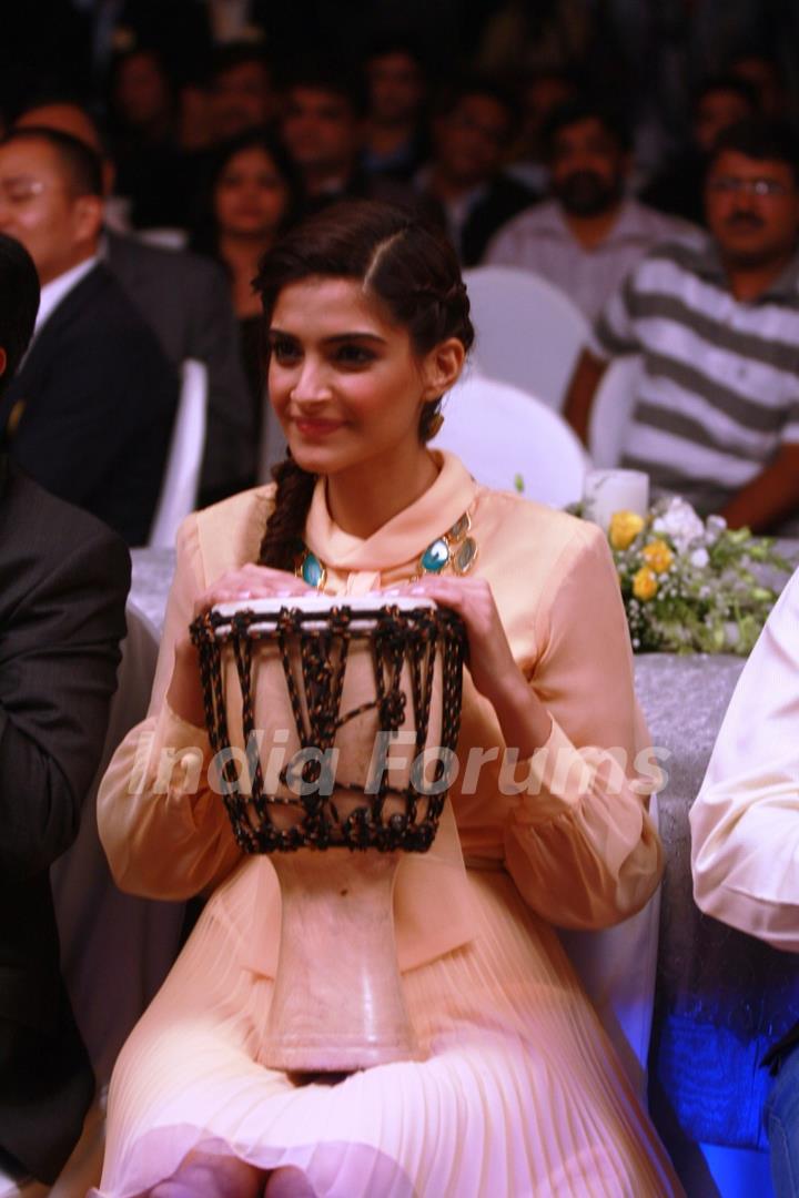 Sonam Kapoor playing the African drum at new range launch of Spice Mobiles in Mumbai