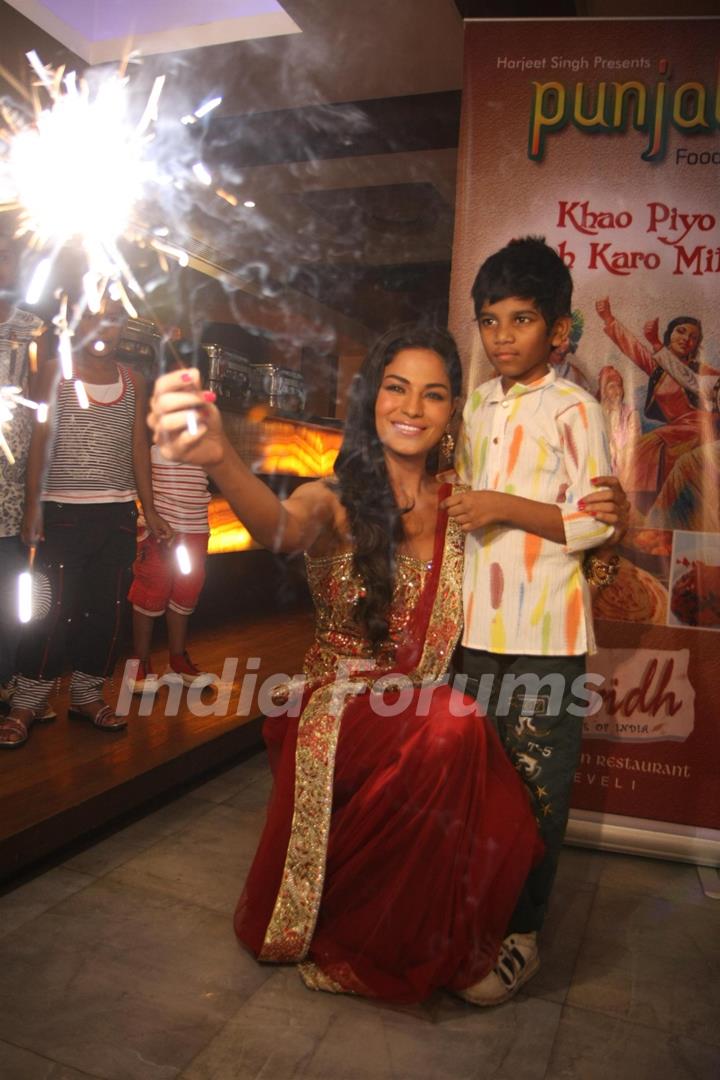 Veena Malik in a Diwali theme photo shoot with her newly adopted daughter Payal Kamble in Mumbai