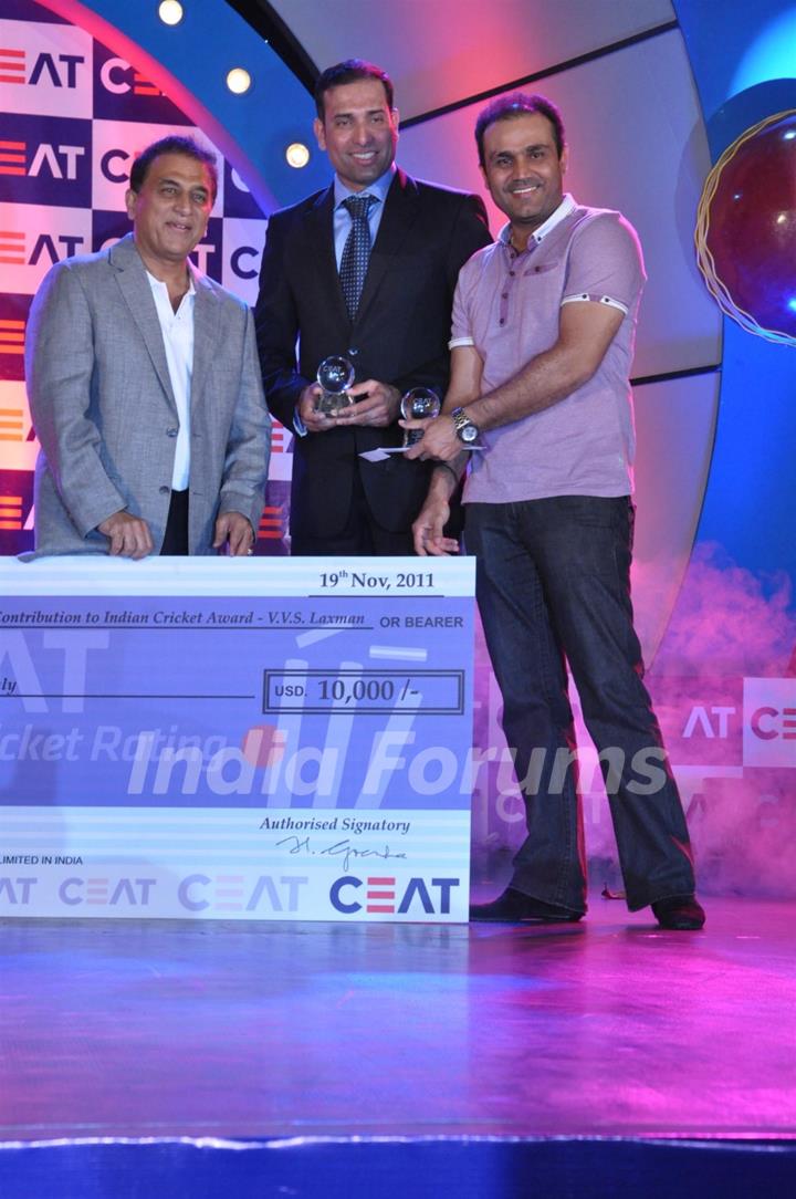 Sunil Gavaskar honoured Virender Sehwag and VVS Laxman at CEAT Cricket Rating Awards 2011 in Mumbai