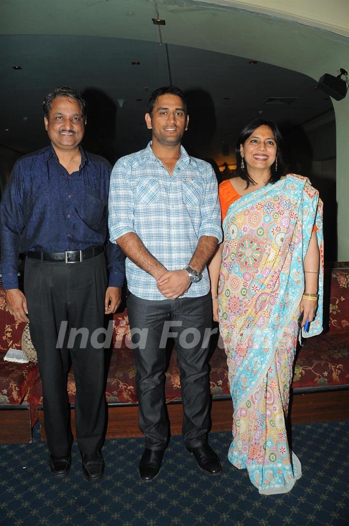 Mahendra Singh Dhoni with Y.P. singh and Abha Singh releasing the music of the film and Novel