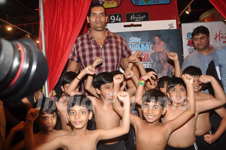 WWE Superstar Khali poses during the launch of game &quot;The Great Khali&quot; at Hamleys