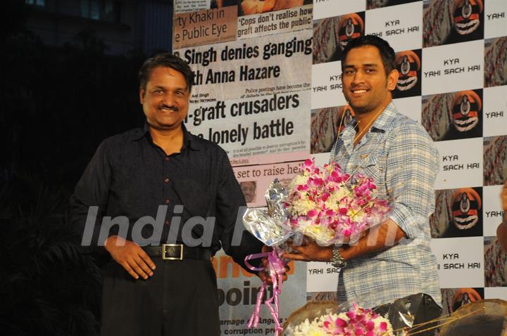 Mahendra Singh Dhoni with director Y.P Singh at the music launch of film &quot;Kya Yahi Sach Hai&quot;