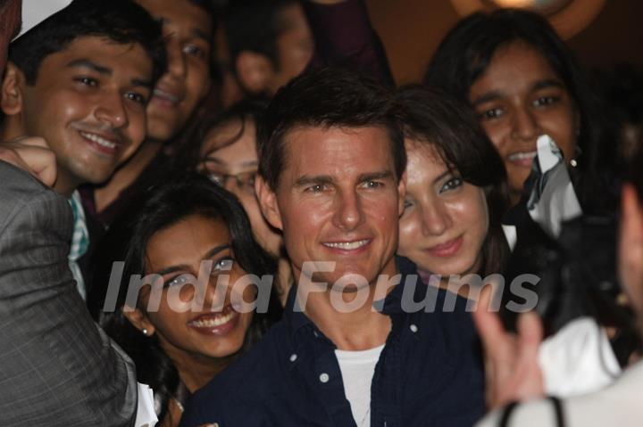 Tom Cruise poses for a photo before a special screening of film Mission Impossible at IMAX Wadala