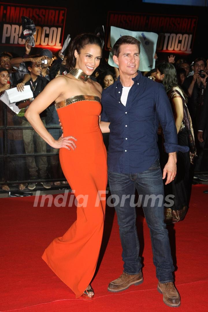 Tom Cruise and Paula Patton poses for a photo before a special screening of film Mission Impossible