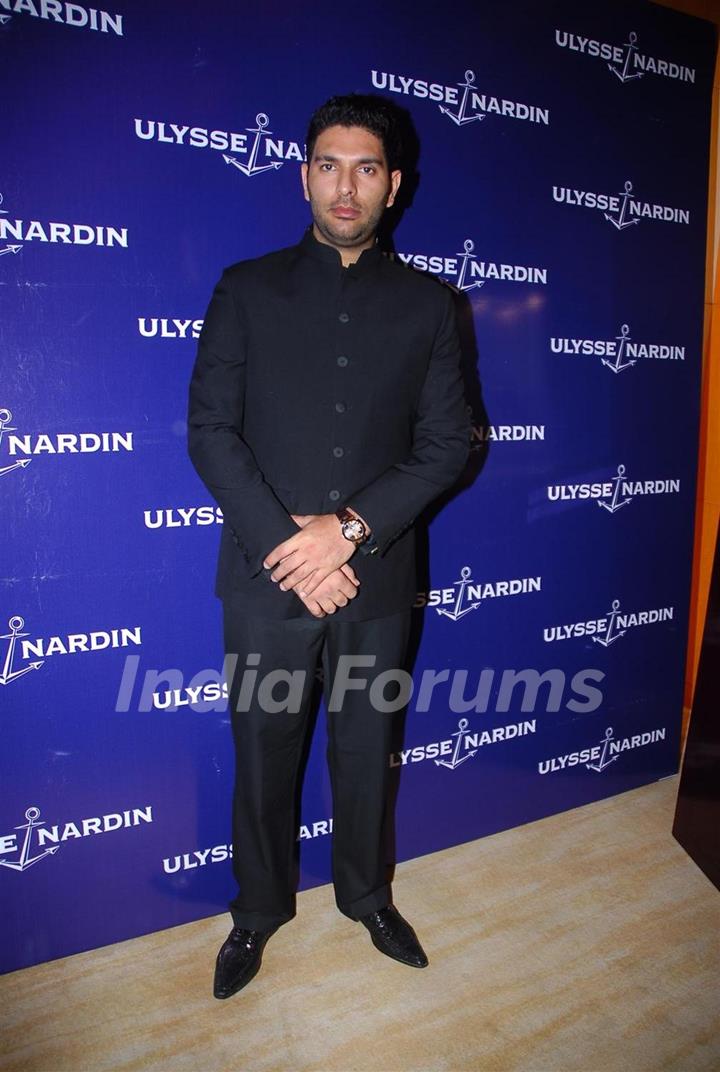 Indian cricketer Yuvraj Singh poses during the unveiling of 'Ulysse Nardin' limited edition watches in Mumbai