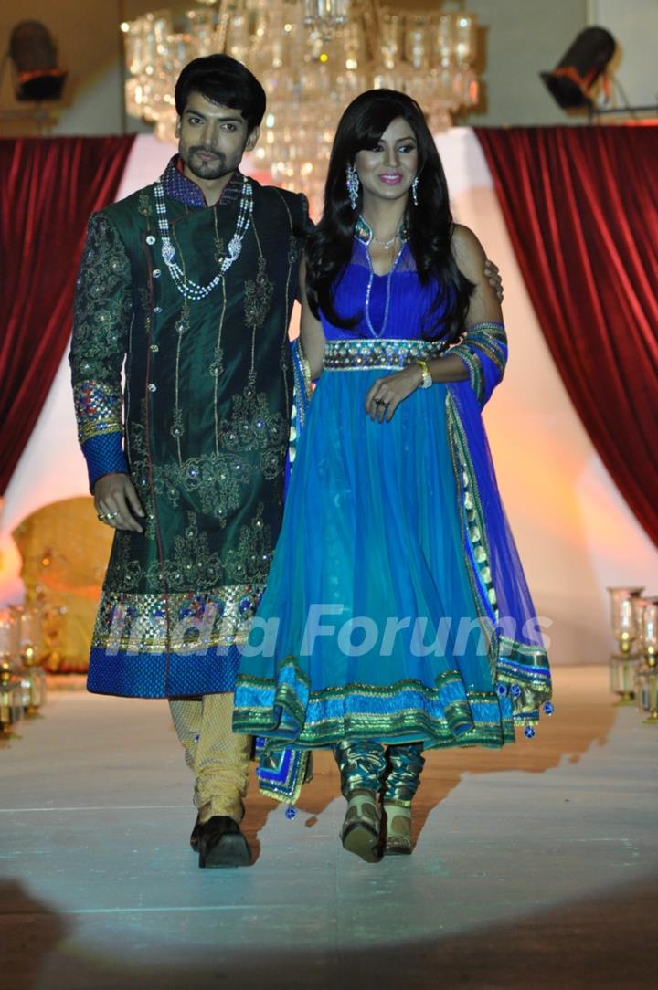 Gurmeet Choudhary and Debina walk the ramp for designer Nisha Sagar Bridal Collection