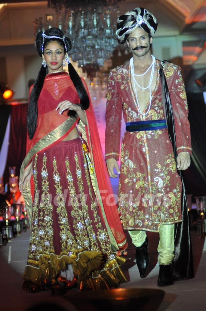 Models walk the ramp for designer Nisha Sagar Bridal Collection