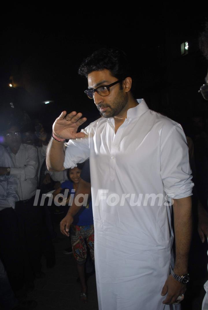 Abhishek Bachchan pays respect at Dev Anand's prayer meet.