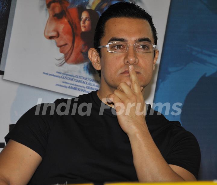 Aamir Khan launches DVD of their film DHOBI GHAT at the Crossword store in Mumbai