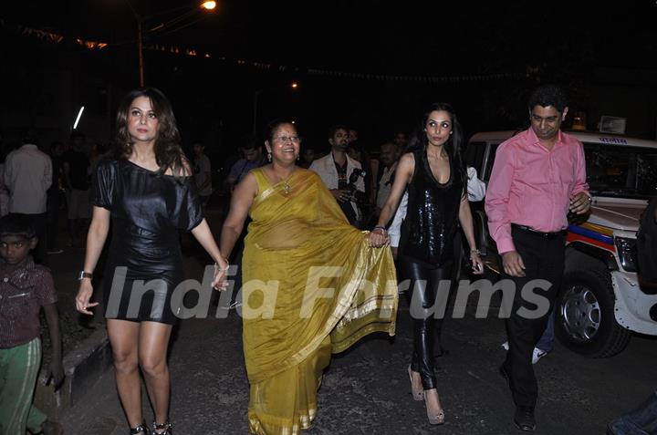 Malaika Arora Khan and Amrita Arora at Midnight Mass in Mumbai