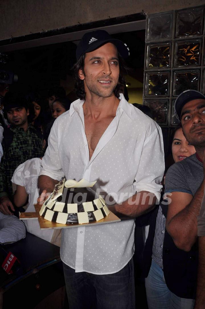 Hrithik Roshan poses with his birthday cake as he celebrates his 38th Birthday in Mumbai