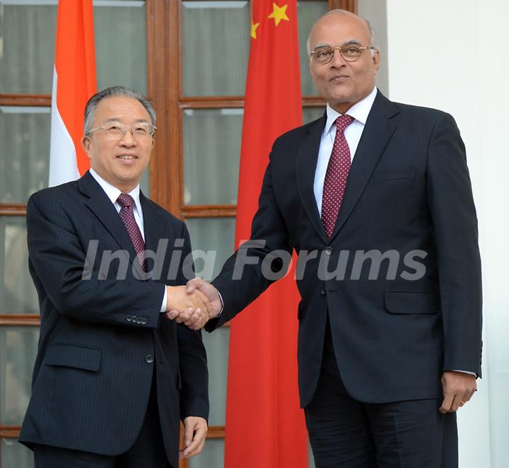 Chinese State Councilor Dai Bingguo pose along with Indian National Security Adviser Shivshankar Menon in between the 15th Round of India-China Special Representatives Talks at Hyderabad House in New Delhi, India, Monday, Jan. 16, 2012. (Photo ...