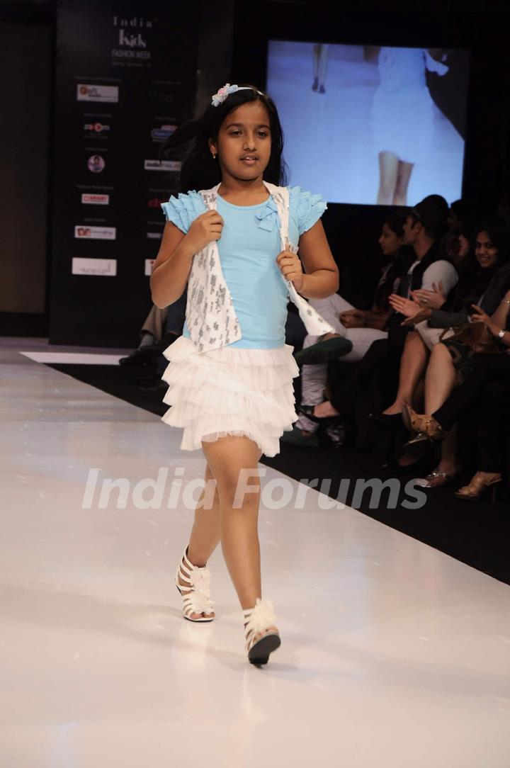 Kid walks on the ramKid walks on the ramp forp for JFK at India Kids Fashion Week day 1 in Mumbai. .