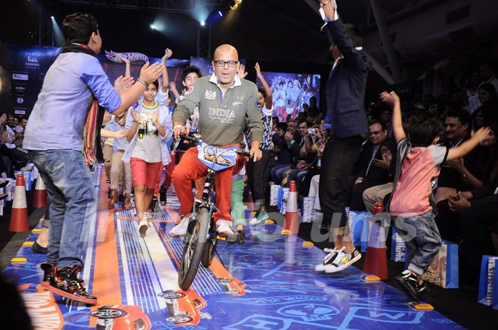 Kids walk on the ramp for Hotwheels designed by Narendra Kumar at India Kids Fashion Week in Mumbai