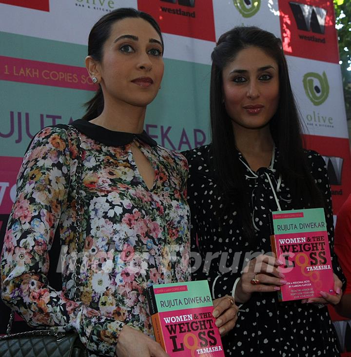 Karisma Kapur & Kareena Kapoor unveiling the book of 'Women & The Weight Loss Tamasha' written by Rujuta Diwekar at Olive Bar