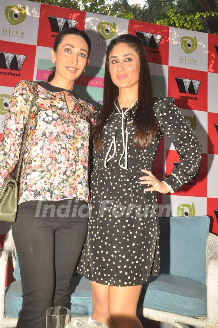 Karisma Kapur & Kareena Kapoor unveiling the book of 'Women & The Weight Loss Tamasha' written by Rujuta Diwekar at Olive Bar